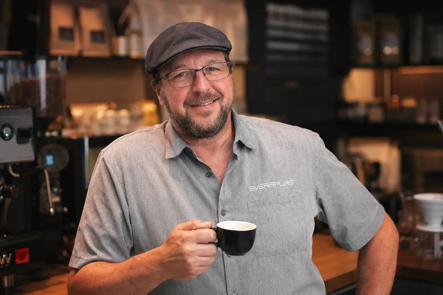 Ronny Billemon holding a coffee cup